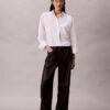 Pantaloni din imitație de piele cu 5 buzunare