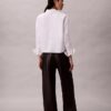 Pantaloni din imitație de piele cu 5 buzunare