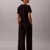 Pantaloni largi cu dungi din țesătură Ponte Pantaloni largi cu dungi din țesătură Ponte