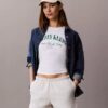 Pantaloni scurți din fleece cu logo de arhivă Pantaloni scurți din fleece cu logo de arhivă