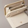 Portofel minimalist cu clapetă și fermoar, cu Monogram Portofel minimalist cu clapetă și fermoar, cu Monogram