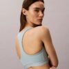 Sutien sport Icon Sport cu monogramă pe toată suprafața, pentru impact mediu