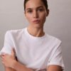 Tricou clasic cu logo tip scris pe toată suprafața Tricou clasic cu logo tip scris pe toată suprafața