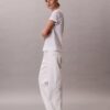 Tricou clasic cu logo tip scris pe toată suprafața Tricou clasic cu logo tip scris pe toată suprafața