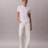 Tricou clasic cu logo tip scris pe toată suprafața Tricou clasic cu logo tip scris pe toată suprafața