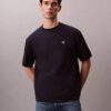 Tricou cu guler rotund, croială lejeră, cu logo din arhivă Tricou cu guler rotund, croială lejeră, cu logo din arhivă