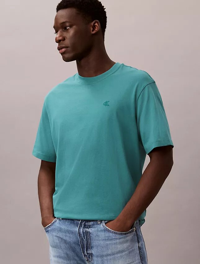 Tricou cu guler rotund, croială lejeră, cu logo din arhivă Tricou cu guler rotund, croială lejeră, cu logo din arhivă