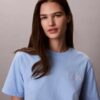 Tricou drept cu imprimeu grafic Calvin Klein în stil cursiv Tricou drept cu imprimeu grafic Calvin Klein în stil cursiv