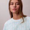 Tricou drept cu monogramă pe toată suprafața Tricou drept cu monogramă pe toată suprafața