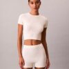 Tricou fără cusături cu emblemă din tricot cu nervuri