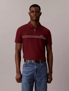 Tricou polo cu fermoar pe un sfert și bordură contrastantă