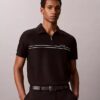 Tricou polo cu fermoar pe un sfert și bordură contrastantă