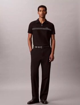 Tricou polo cu fermoar pe un sfert și bordură contrastantă