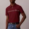 Tricou polo cu fermoar pe un sfert și bordură contrastantă
