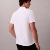 Tricou polo cu fermoar pe un sfert și bordură contrastantă