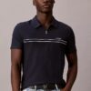 Tricou polo cu fermoar pe un sfert și bordură contrastantă