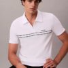 Tricou polo cu fermoar pe un sfert și bordură contrastantă